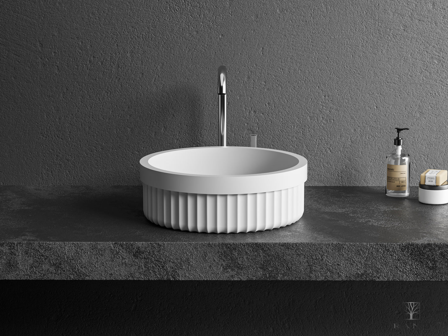 Hvit rund bolleresvant i solid surface med inverterte riller og glatt ramme øverst fra Brandt Bad Sett forfra.
